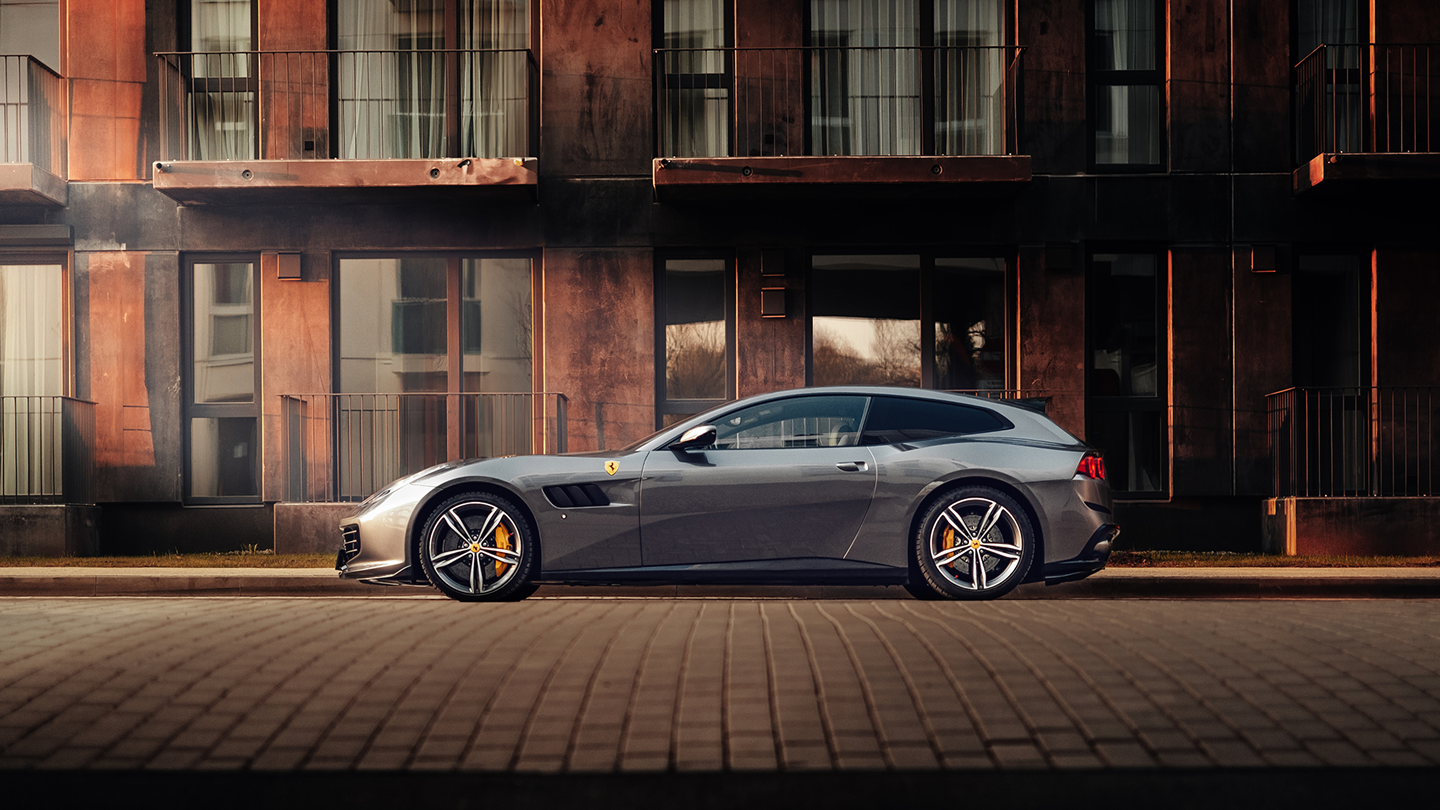 Sleek gray Ferrari parked elegantly.